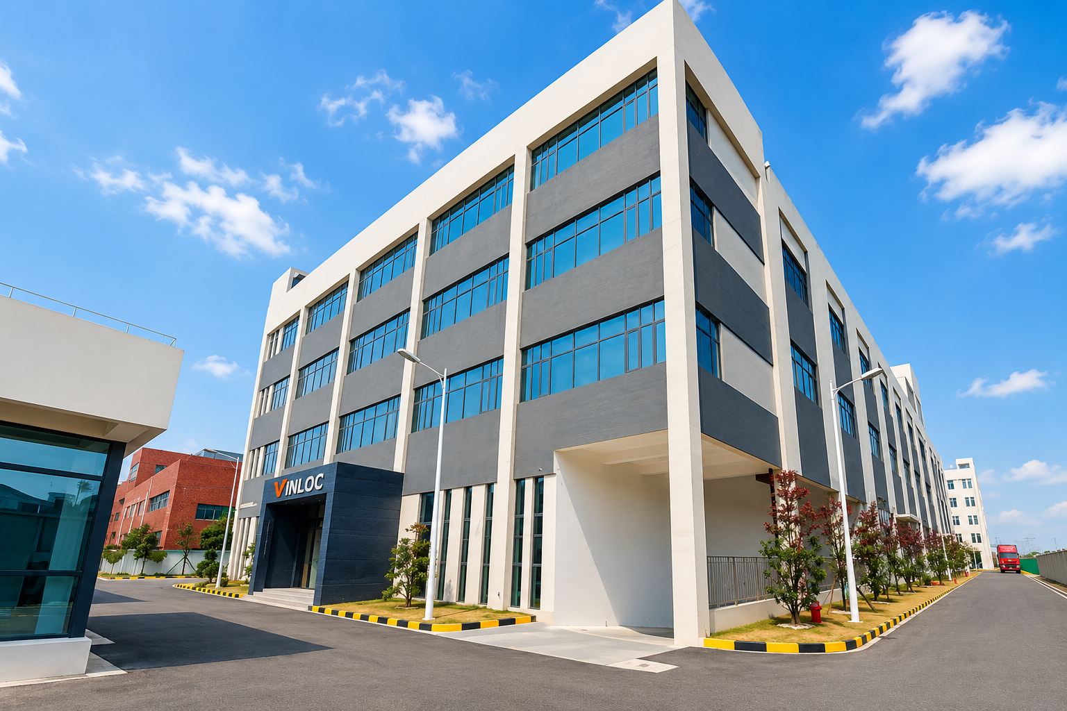 VINLOC Suzhou manufacturing facility with red lorry